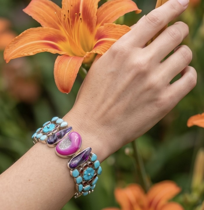 Just Fabulous 88.5 grams Large Pink Titanium Agate Druzy .925 Sterling Silver handcrafted Bracelet - Bracelet worn on wrist with orange lily background.