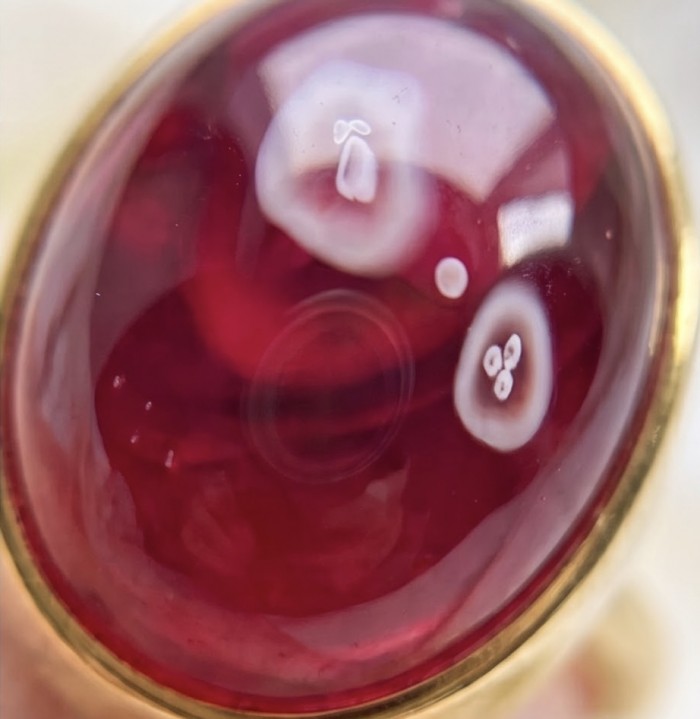 Giovanna 15.7 carat Kashmir Star Ruby .925 Sterling Silver dipped in 22K Gold handmade Statement Ring size 7 1/2 - Close-up of Kashmir Ruby stone on sterling silver jewelry.