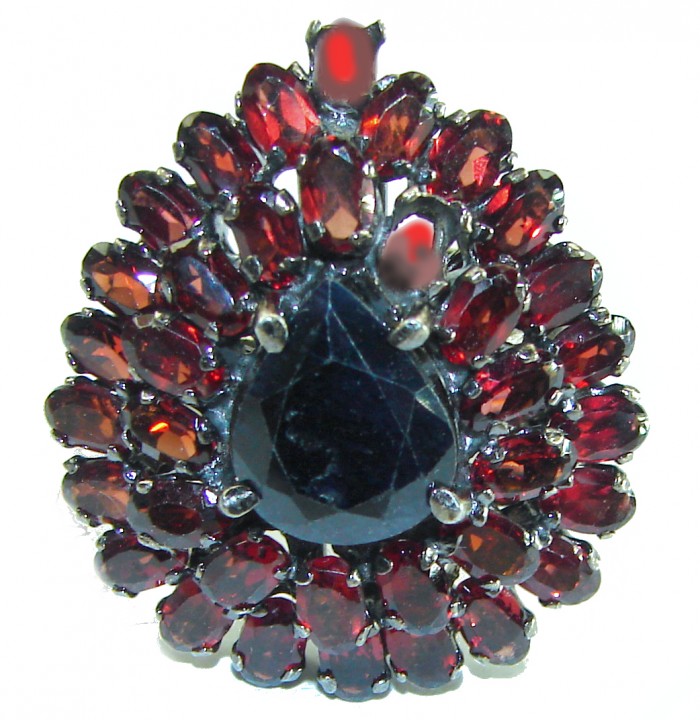 Blue Odyssey 22.5 carat authentic Sapphire black rhodium over .925 Silver handcrafted Cocktail Ring s. 8 1/2 - Close-up of Blue Odyssey 22.5 carat sapphire ring with garnets