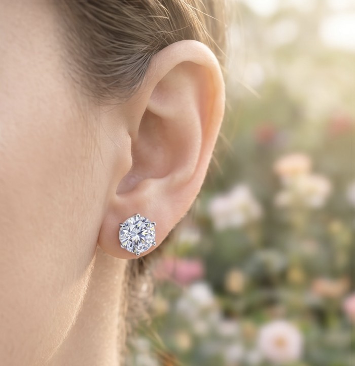 Veronica - 12.2 carat White Topaz rhodium over .925 Sterling Silver earrings, 10mm wide - Close-up of earring worn, white topaz stud in rhodium over sterling silver.