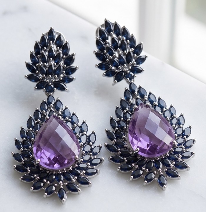 Giuseppina - Authentic 26.5 carat Amethyst Sapphire rhodium over .925 Sterling Silver handcrafted Statement earrings - Amethyst sapphire earrings close-up on a flat surface