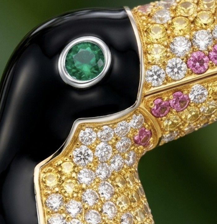 Exotic Toucan - Genuine 2.5 carat pave Ruby Emerald black enamel .925 Sterling Silver dipped in 18k Gold handmade Pendant - Brooch - Close-up of Exotic Toucan jewelry with emerald and multicolored gemstones.
