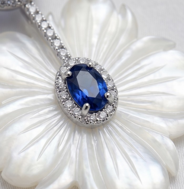Summer Flowers Blister Pearl Blue Topaz 14K Gold over .925 Sterling Silver handcrafted Earrings - Close-up of blue topaz pendant on pearl flower setting with diamonds