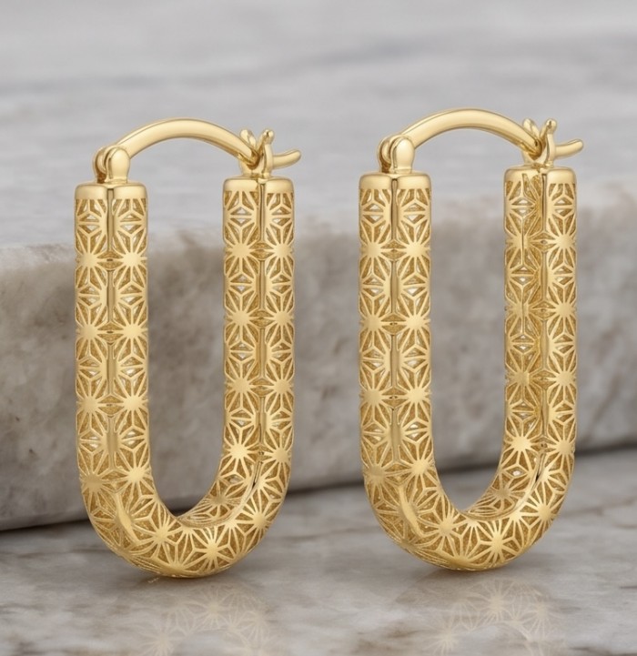 Black Label Collection - Dubai Style - Natural 22K Gold over .925 Sterling Silver handmade earrings - Close-up of U-shaped gold hoop earrings with intricate pattern.