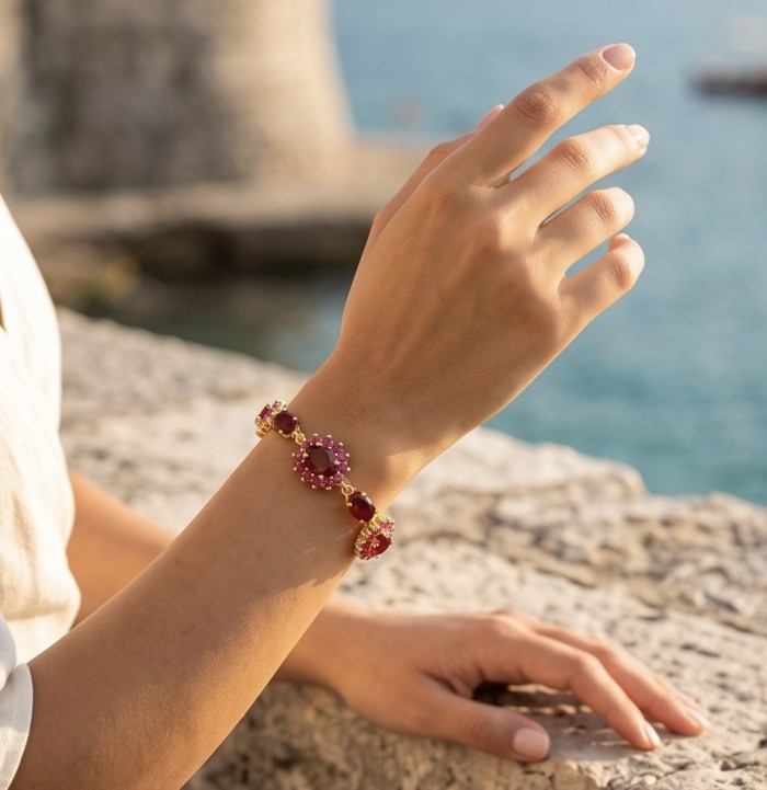Bella Rosa - 29.4 carat authentic Mozambique Ruby .925 Sterling Silver dipped in 22K Gold handcrafted Bracelet - Bracelet featuring Bella Rosa Ruby, worn on wrist by the sea.