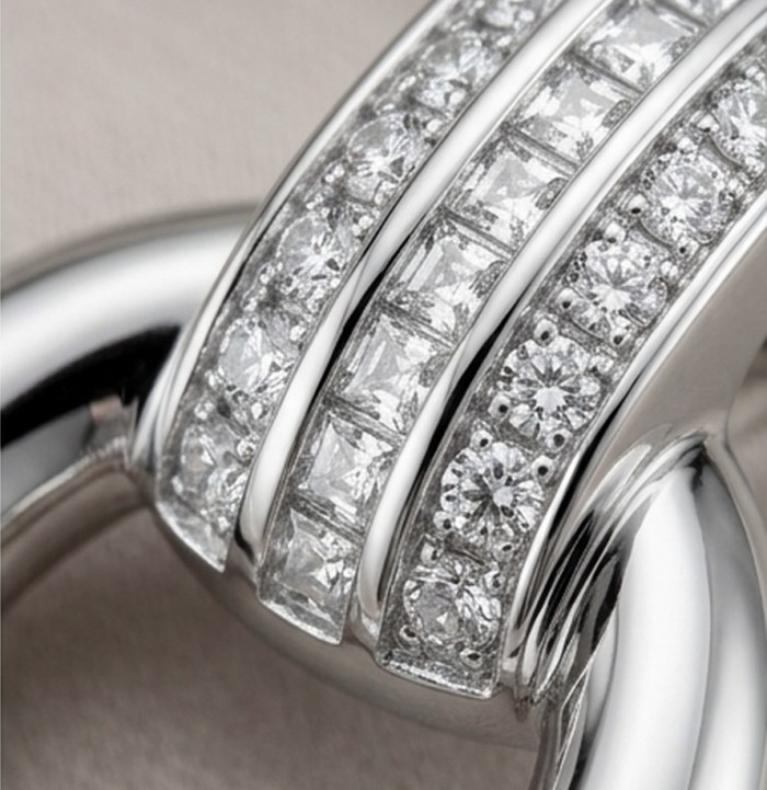 Genuine 0.9 carat White Topaz .925 Sterling Silver handcrafted Statement Earrings - Close-up of white topaz and sterling silver ring detail.