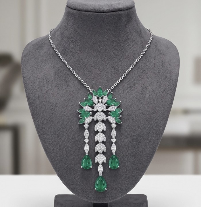 Precious 7.8 carat natural Colombian Emerald rhodium over .925 Sterling Silver Statement Necklace - Front view of emerald and diamond necklace on display bust