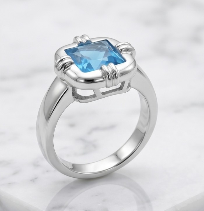 8.5 carat authentic Swiss Blue Topaz .925 Sterling Silver dipped in rhodium handmade Statement Ring size 8 1/4 - Side view of a Swiss Blue Topaz ring in sterling silver.