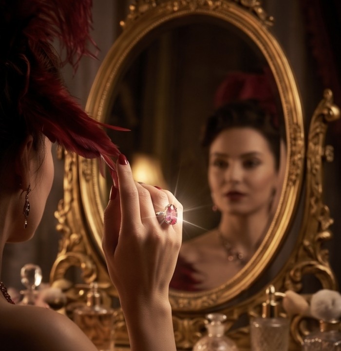 Carmen Natural 25.4 carat Ruby .925 Sterling Silver dipped in 22K Gold handmade Large Statement Ring size 8 3/4 - Woman wearing 25.4 carat ruby ring, seen in a mirror reflection.