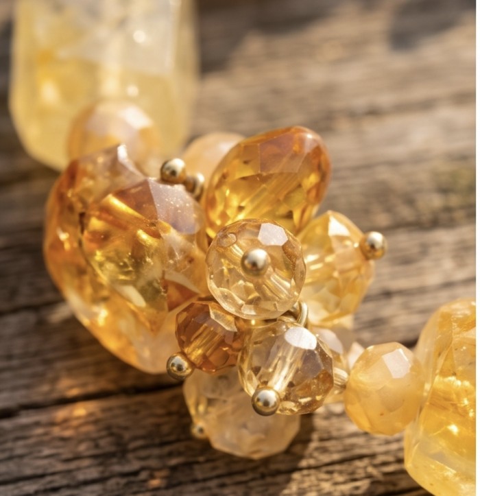 Dazzling vintage natural rough Citrine 14K Gold over .925 Sterling Silver handcrafted Large necklace - Close-up of vintage Citrine and gold jewelry on wooden surface