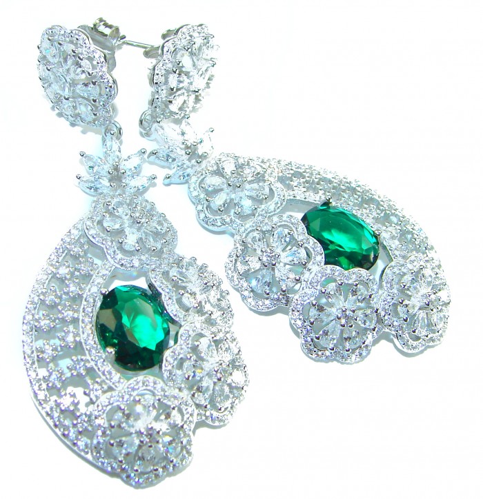 Special design! Opera - Precious - 11.8 carat Emerald .925 Sterling Silver handcrafted Statement earrings - Close-up of intricate earrings with emerald and floral designs.