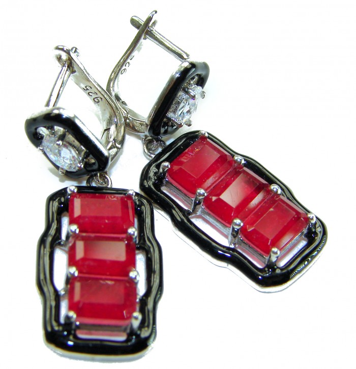 Royalty 5.2 carat Ruby .925 Sterling Silver .925 Sterling Silver Statement earrings - Close-up of ruby and silver earrings with clasp detail.