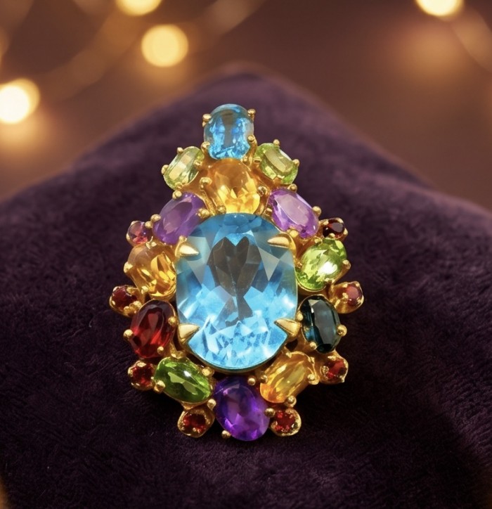 Majestic - Vintage style oval cut 15.8 carat Swiss Blue Topaz .925 Sterling Silver DIPPED IN 22 carat Gold handmade Pendant Brooch - Close-up of Majestic ring with Swiss Blue Topaz and multicolored gemstones.
