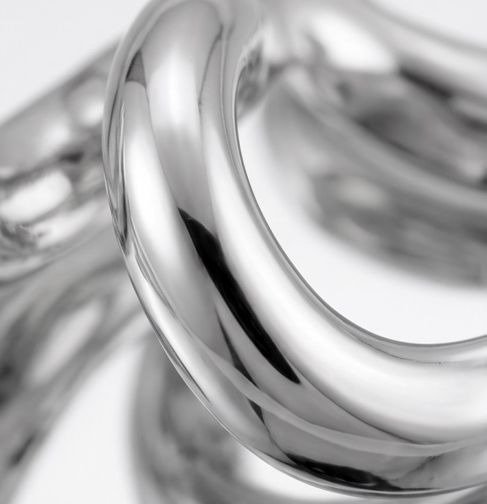 Spiral design Italy made .925 Sterling Silver handcrafted Earrings - Close-up of spiral design sterling silver jewelry, macro detail.