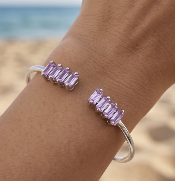 Precious Light Natural 5.2 carat Kunzite .925 Sterling Silver bracelet - Kunzite bracelet on wrist, beach background, sterling silver frame.