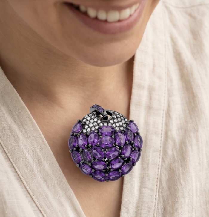 Mademoiselle - 18.5 carat natural Amethyst .925 Sterling Silver dipped in black rhodium handcrafted Pendant Brooch - Pendant with purple amethysts and diamonds, worn on neck, close-up view.