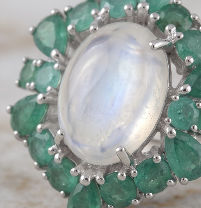 Rosemary - Top quality 27.2 carat Brazilian Rose Quartz .925 Sterling Silver dipped in rhodium Handcrafted Statement earrings - Close-up of moonstone with emerald halo in silver setting.