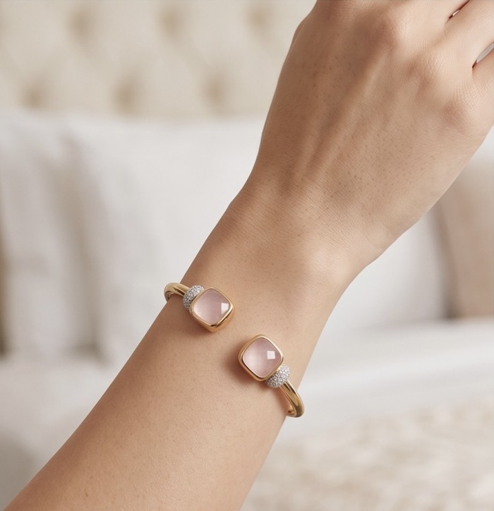 Precious Light Natural 8.2 carat Rose Quartz 0.6 carat Moissanite 14K Gold over .925 Sterling Silver open-ended bracelet - Bracelet with rose quartz and moissanite, worn on wrist, close-up view.