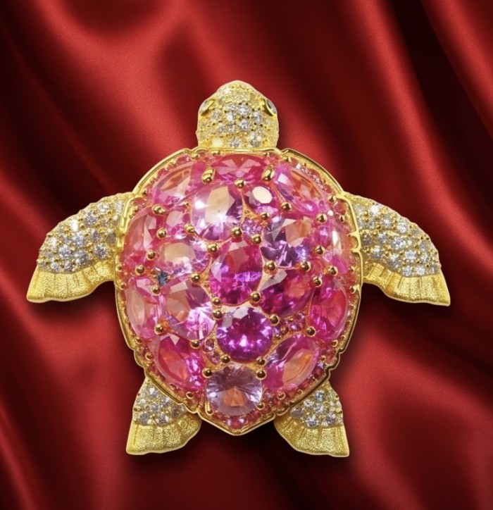 Pink Turtle Authentic 14.2 carat Pink Tourmaline 18K Gold over .925 Sterling Silver handcrafted Statement Pendant Brooch - Turtle-shaped brooch with pink tourmaline and gold, on red fabric background.