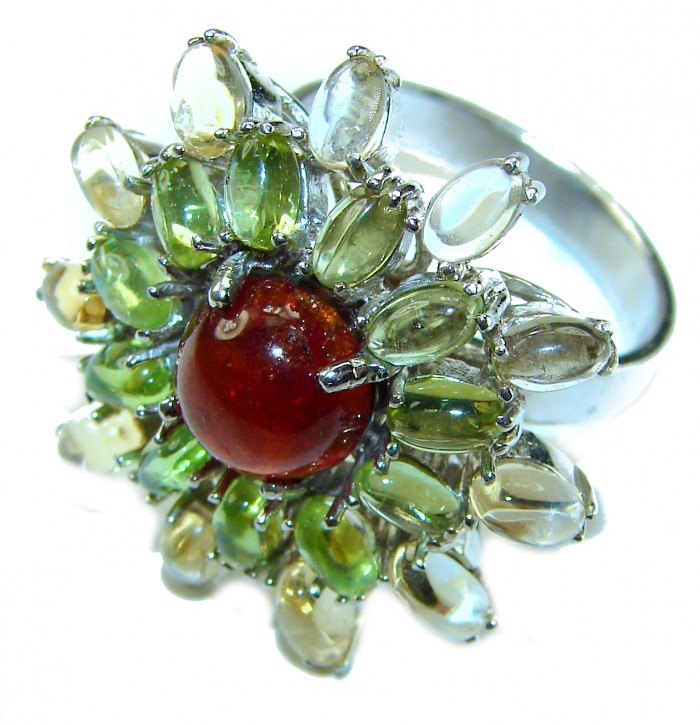 Bella Rosa Natural 18.4 carat Ruby .925 Sterling Silver handmade Large Statement Ring size 9 1/4 - Close-up of Bella Rosa 18.4 carat ruby ring with silver and green accents.