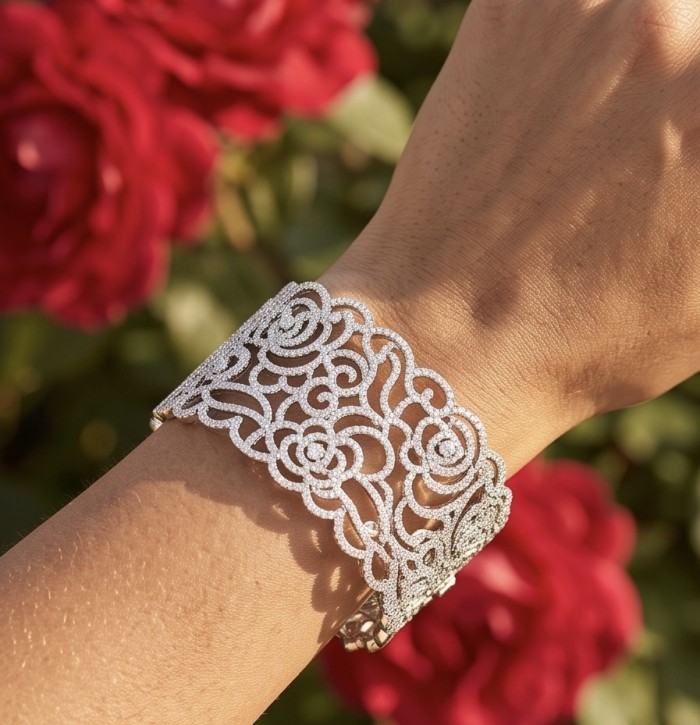 Dolce Vita - Precious Natural 12.5 carat pave White Topaz rhodium over .925 Sterling Silver handcrafted bracelet - Worn on wrist, intricate design, with red roses in background