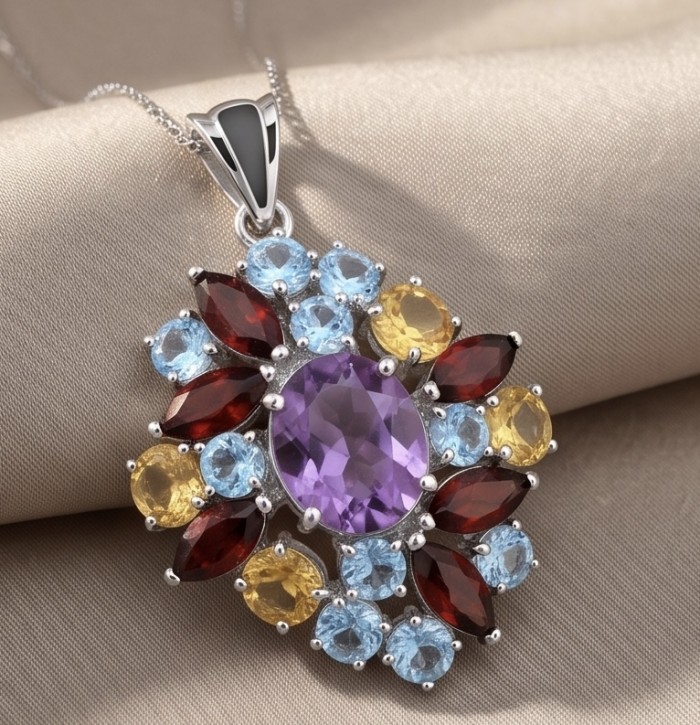 Natural 19.6 carat Fancy cut Amethyst rhodium over .925 Sterling Silver handmade pendant - Pendant with amethyst, citrine, garnet, and topaz, front view on fabric.
