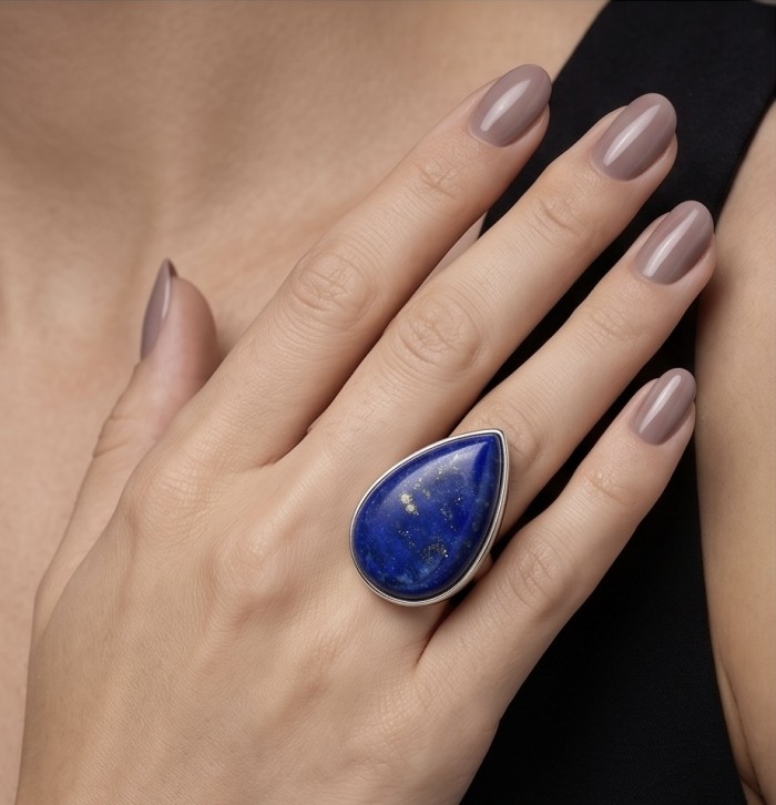 Natural 24.5 carat Lapis Lazuli .925 Sterling Silver handcrafted ring size 8 adjustable - Lapis Lazuli 24.5 carat ring on hand, showcasing stone front view.