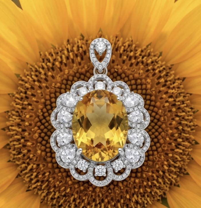 Costa del Sol 18.8 carat Citrine .925 Sterling Silver handcrafted Statement pendant - Close-up of Costa del Sol Citrine pendant on sunflower background