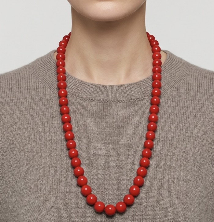 Konstancia Sublime natural Red Fossilized Coral Sterling Silver handmade Necklace - Necklace worn, front view, red fossilized coral beads on gray sweater