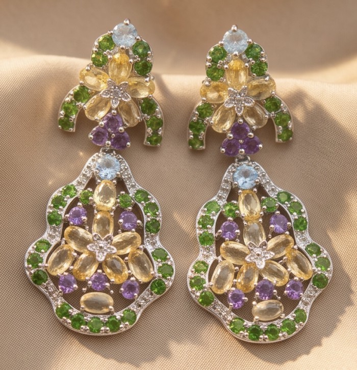 Giovanna - Authentic 18.9 carat Brazilian Citrine .925 Sterling Silver dipped in rhodium handcrafted earrings - Colorful gemstone earrings on a beige background, front view.