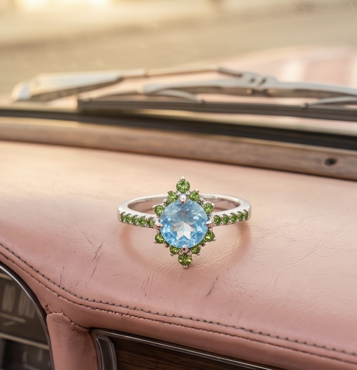 Pacifica 4.8 carat Swiss Blue Topaz .925 Sterling Silver handcrafted ring size 9 - Close-up of Pacifica 4.8 ct blue topaz ring on a pink surface.