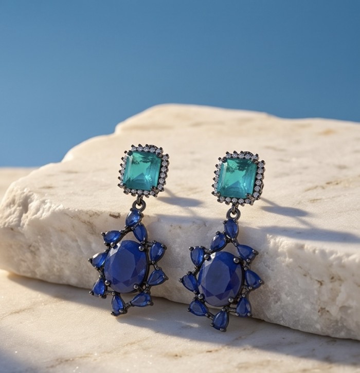 Vintage style - Giovanna - 14.8 carat Sapphire Emerald black rhodium over .925 Sterling Silver handcrafted earrings - Close-up of vintage style sapphire and emerald earrings on marble.