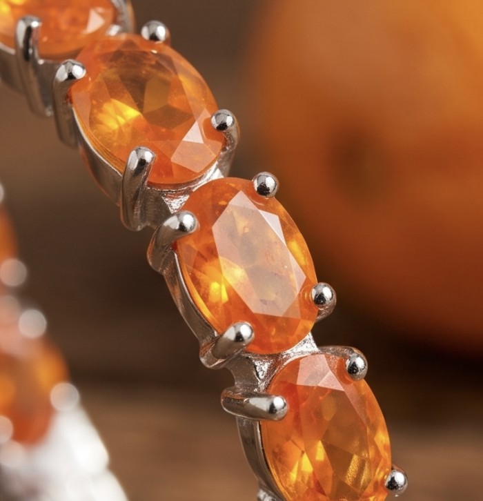 Valentina 3.7 carat Natural Fire Orange Opal rhodium over .925 Sterling Silver handcrafted inside - out Hoop earrings - Fire orange opal bracelet stone close-up, rhodium setting.