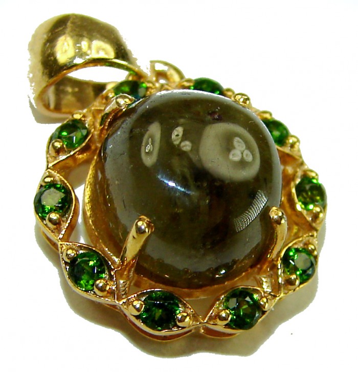 Deluxe 10.2 carat Grandidierite 18k Gold over .925 Sterling Silver handmade Pendant - Close-up of 10.2 carat Grandidierite pendant with green gemstones.