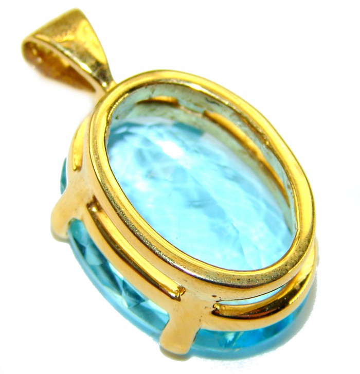 Atlantica oval cut 22.9 carat Swiss Blue Topaz 18K Gold over .925 Sterling Silver Handcrafted Pendant - Close-up of Atlantica oval cut Swiss Blue Topaz in 18K gold setting