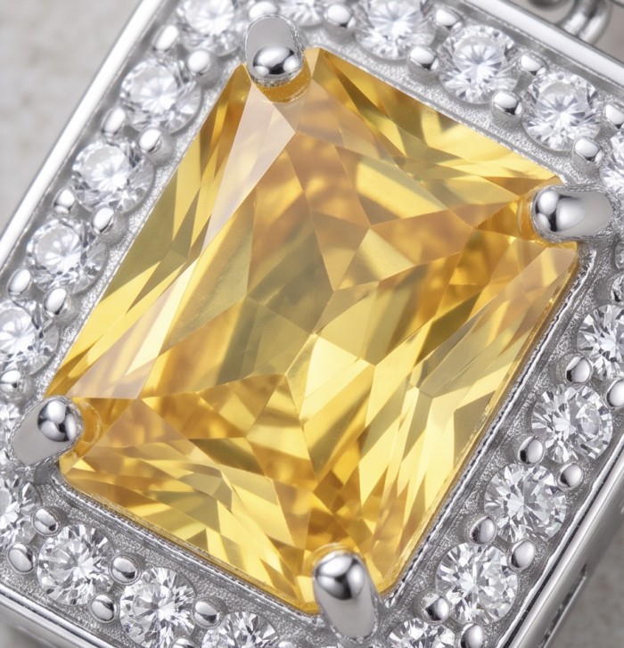 Art Deco - Luxurious baquette cut 8.5 carat Yellow Sapphire rhodium over .925 Sterling Silver handcrafted earrings - Close-up of baquette cut yellow sapphire with diamond accents.