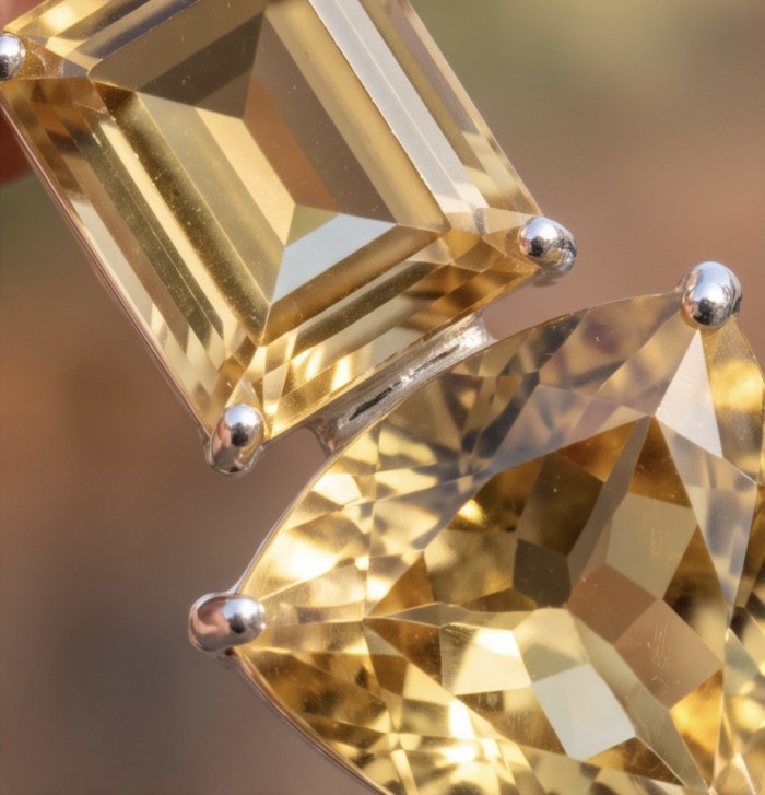 Vivien - Natural 17.2 carat Citrine .925 Sterling Silver dipped in Rhodium handmade pendant - Close-up of Vivien citrine and sterling silver jewelry.