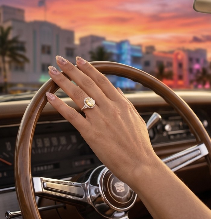 Solid 8.8 carat Genuine Yellow Sapphire .925 Sterling Silver handcrafted ring size 6 - Yellow sapphire ring worn on hand, steering wheel in background.
