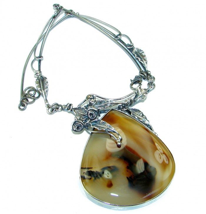 Oversized 85.3 grams Master Piece genuine Botswana Agate .925 Sterling Silver handcrafted necklace - Necklace with large Botswana Agate in decorative silver setting, angled view.