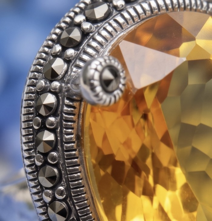 Authentic oval cut 31.2 carat Golden Topaz rhodium over .925 Sterling Silver ring s. 8 - Stone close-up of 31.2 carat Golden Topaz with decorative rhodium setting.