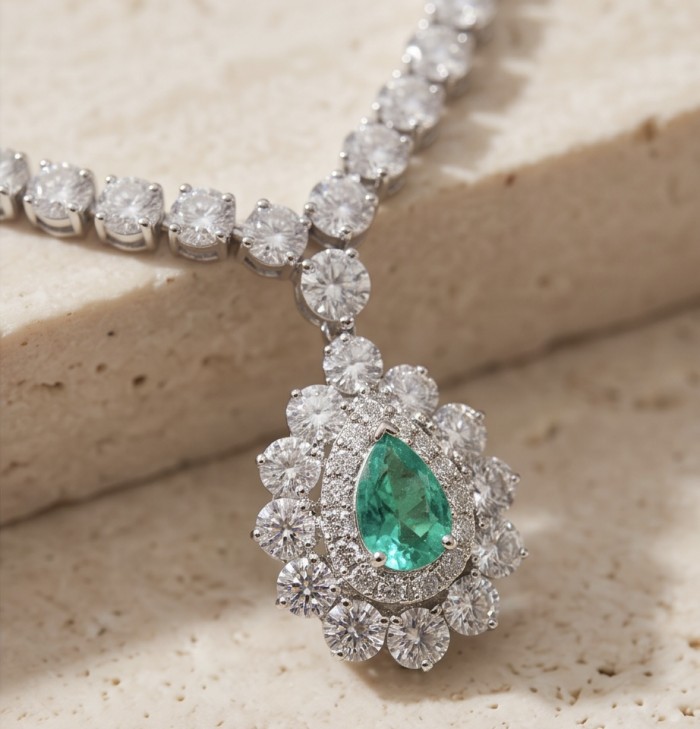Estelle - Authentic 7.9 carat COLOMBIAN EMERALD .925 Sterling Silver handcrafted necklace - Close-up of Estelle necklace with emerald and diamond details.