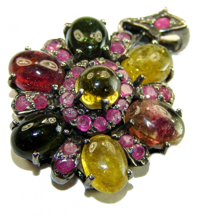 14.5 carat Brazilian Watermalon Tourmaline black rhodium over .925 Sterling Silver handmade Pendant - Close-up of colorful Brazilian tourmaline jewelry on white background