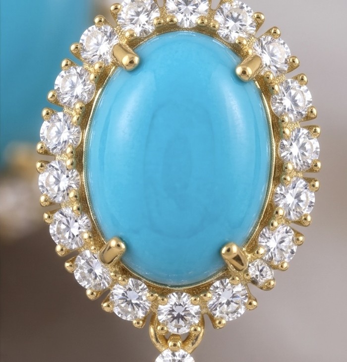 Blue Dreamland - Luxurious stabilized Turquoise 18K Gold over .925 Sterling Silver handmade Statement earrings - Close-up of Blue Dreamland turquoise with diamond accents and gold setting.