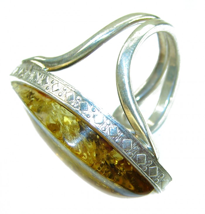 Large - Golden Power Baltic Amber .925 Sterling Silver handcrafted ring; s. 7 adjustable - Side view of large Baltic amber in sterling silver setting.