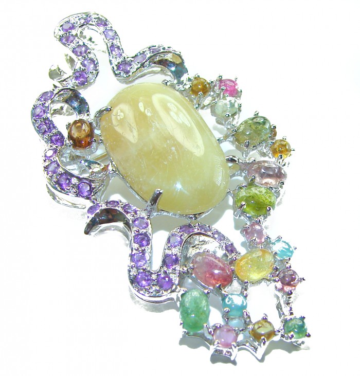 Vintage Design 23.9 Natural Golden Yellow Sapphire .925 Sterling Silver handcrafted Pendant Brooch - Close-up of vintage design natural golden yellow sapphire jewelry.