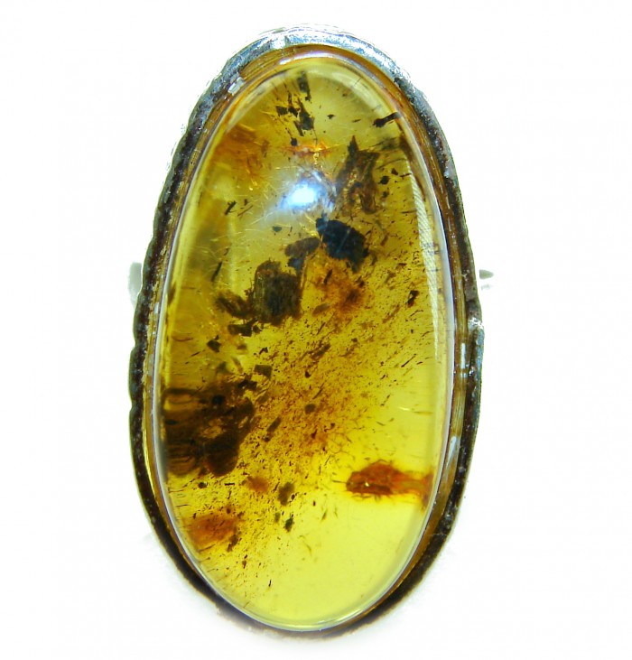 Beauty of the Nature Baltic Amber .925 Sterling Silver handcrafted HUGE ring; s. 7 adjustable - Close-up of Baltic amber in oval setting, silver mount visible.