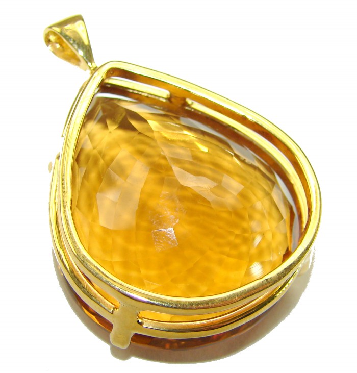 Luxury genuine 53.5 CARAT pear cut Champagne Topaz .925 Sterling Silver dipped in 18K Gold handmade Pendant - Close-up of pear-cut Champagne Topaz pendant in gold setting.