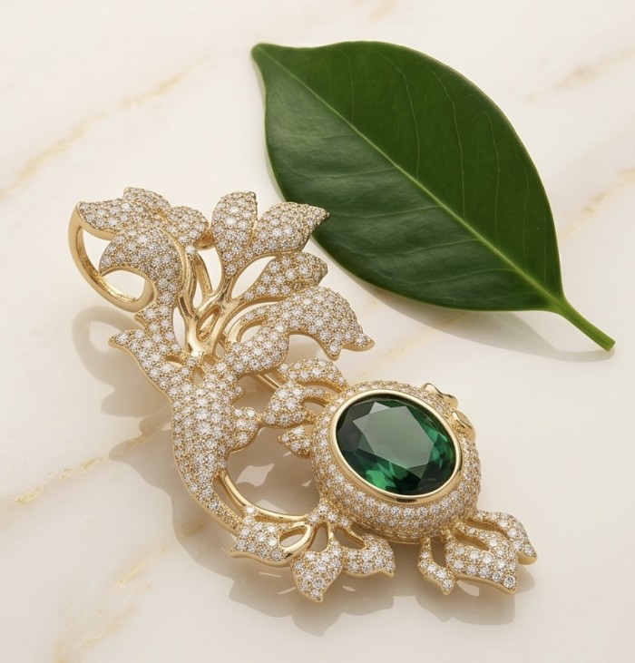 Ultimate Treasure - floral design- 7.2 CARAT Emerald .925 Sterling Silver dipped in 22K Gold handcrafted Pendant Brooch - Jewelry with emerald and diamonds, floral design, top view.