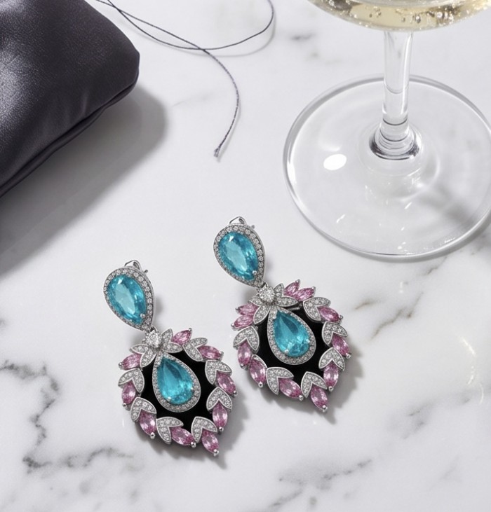 Bellissima Incredible 12.5 carat Paraiba Tourmaline .925 Sterling Silver entirely handmade earrings - Bellissima earrings top view with Paraiba tourmaline and pink accents.