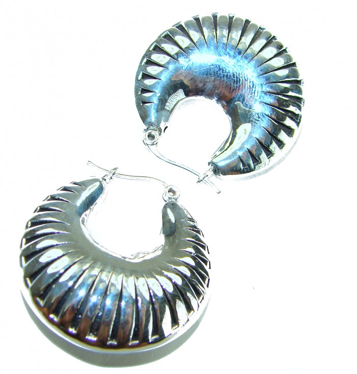 Highly Polished Fancy Modern design .925 Sterling Silver Italy made Earrings - Highly polished .925 sterling silver earrings, top view.